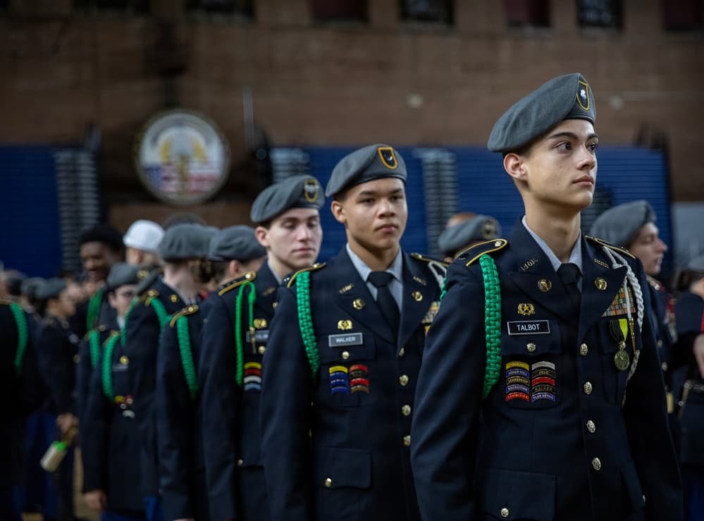 JROTC cadets performing a drill ceremony